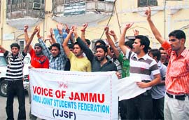 Activists of the JJSF on Monday protest against the lathi-charge by the police on students of Baba Ghulam Shah Bhadshah University, Rajouri