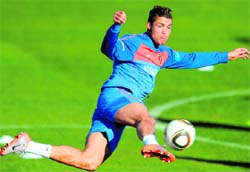 Portuguese captain Cristiano Ronaldo kicks a ball during training in Magaliesburg on Sunday