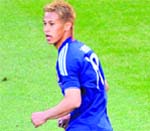 Japans Keisuke Honda celebrates his goal on Monday