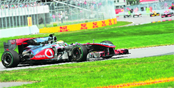 McLaren Mercedes Lewis Hamilton steers his car during the Canadian Formula One Grand Prix in Montreal on Sunday