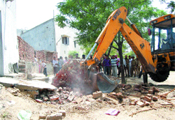 An anti-encroachment drive being carried out by the Government Medical College authorities in Amritsar