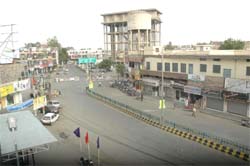 A view of the deserted Mall road of Bathinda on Tuesday. 