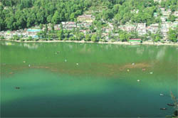 Filth is seen in Naini Lake after rain in Nainital.