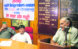 Vipin Gupta, an environmentalist, speaks at a seminar in Mussoorie on Monday