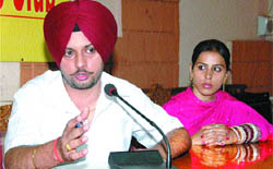Amarpreet Mann speaks to mediapersons in Jalandhar.