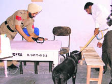 A room being searched for a bomb at the district court complex in Ludhiana on Tuesday and below the device that caused panic
