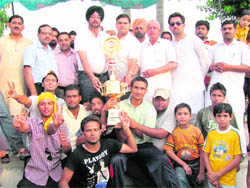 Winners with their trophy at Ahmedgarh.