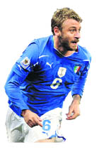 Italys midfielder Daniele De Rossi celebrates after scoring the equaliser against Paraguay in Cape Town on Monday.