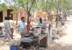 Resham Singh busy at his roadside tea stall on Wednesday at Banawali in Mansa district where a mega thermal power project is coming up