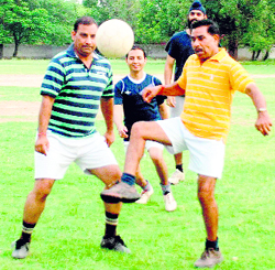 Soccer enthusiasts kicking the ball on the Government Model Senior Secondary School playground in Sector 44, Chandigarh