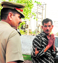 Mohan Lal, who was kidnapped, at the police station in Panchkula on Wednesday