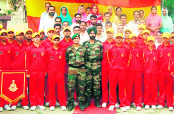 Students of Government High School, Khour, pose for a photograph after returning from an education tour, at 191 Infantry Brigade in Akhnoor.