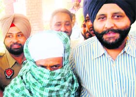 The police takes Sukhdev Singh, alias Sukha, to court in Amritsar