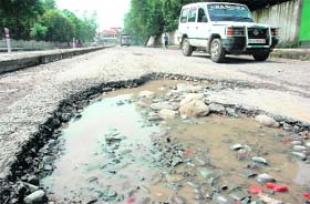The damaged road in front of the Polo Ground in Patiala