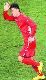 N Koreas defender Ji Yun-Nam celebrates after scoring during the World Cup match against Brazil on Tuesday in Johannesburg.