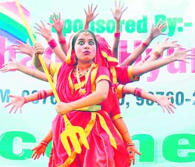 Girls perform Ved Mantryam during the concluding function of a summer camp in Patiala on Thursday.