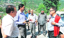 DM D Senthial Pandian (left) expresses discontent over unhygienic lavatories before Nagar Palika president OP Uniyal in Mussoorie on Thursday.