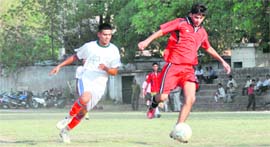 A match of the Lala Nemi Das Memorial Football League in progress at the Pvillion Ground in Dehradun on Thursday.