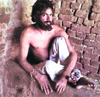 Balwinder Singh in shackles at his house Dholewal village.