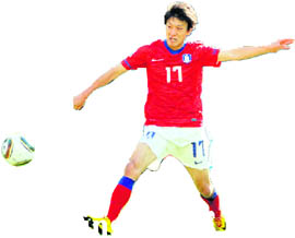 South Koreas midfielder Lee Chung-Yong scores during their Group B match in Soweto on Thursday.