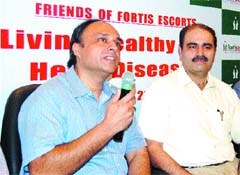 Dr Deepak Kapila (left), senior consultant, addresses mediapersons in Amritsar.