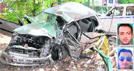 The mangled remains of the Maruti Zen, which met with an accident at the Chawla Nursing Home traffic junction, resulting in the death of Jaswinder (top) and Ravi, in Mohali on Friday.