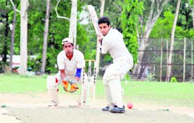 A batsman faces a delivery in a match of the Uttarakhand Challenger Cup Cricket Tournament at the OFD Ground in Dehradun