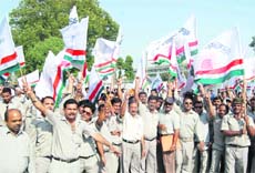 BHEL employees agitate in Haridwar on Friday. 