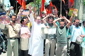 Members of the Shiv Sena protest against the Food and Supplies Department in Jammu