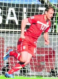 Serbia's midfielder Milan Jovanovic celebrates after scoring the winner against Germany in Port Elizabeth