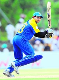 Sri Lankas Tillakaratne Dilshan plays a stroke during the third ODI of the Asia Cup between Sri Lanka and Bangladesh in Dambulla