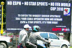 A hoarding put up by ESPN that appeals to football enthusiasts to ensure telecast of World Cup matches from cable operators in Dehradun on Saturday