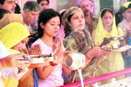 Devotees offer prayers at Mata Khirbhawani temple in Jammu on Saturday