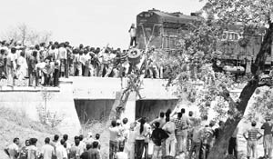 The train-bus accident at an unmanned level crossing near Jalandhar on Friday.