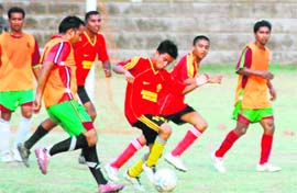 Players in action at the Lala Nemi Das District Football League in Dehradun on Sunday.