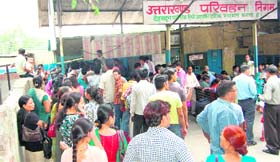 Mussoorie bus station witness long queues of tourists rushing towards the hill station on Sunday.