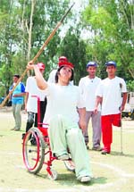 A player participates in javelin throw at the first Uttarakhand State Paralympic Games in Dehradun on Sunday.