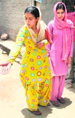 Poonam and Suman, who battered a killer to death on Saturday after their family was attacked by two motorcycle-borne criminals, resulting in the death of a family member, at their residence at Karontha village in Rohtak on Sunday.