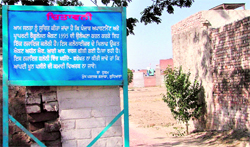 A signboard put up by GLADA at an unauthorised colony under development in the city, which has since been removed
