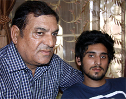 Nandan (right) with his father Raj Nagpal at his Malout residence on Sunday