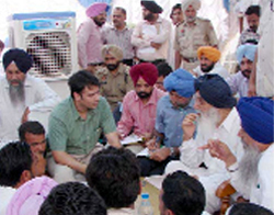 CM Parkash Singh Badal listening to grievances 