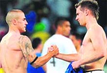 Italian captain Fabio Cannavaro shakes hands with New Zealands Shane Smeltz on Sunday. 