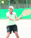 Sefali Vohra returns a shot during a tennis match in Chandigarh