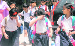 Students of Kendriya Vidyalaya, Sector 31, sweat it out on Monday afternoon in Chandigarh.