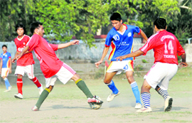 A match of the Lala Nemi Das Memorial Football League in progress at the Pavilion Ground in Dehradun on Monday