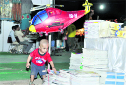 A child at a trade fair held at the Parade Ground in Dehradun on Monday