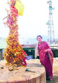A devotee at the Surkhanda Devi temple near Mussoorie on Monday