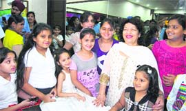 Saroj Khan along with children during the launch of her academy in Ludhiana.