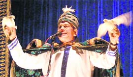 Magician Shanker Samrat displays pigeons in his magic show in Ludhiana.
