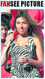 A Chilean supporter cheers prior to the start of the Chile vs. Switzerland match in Port Elizabeth on Monday.